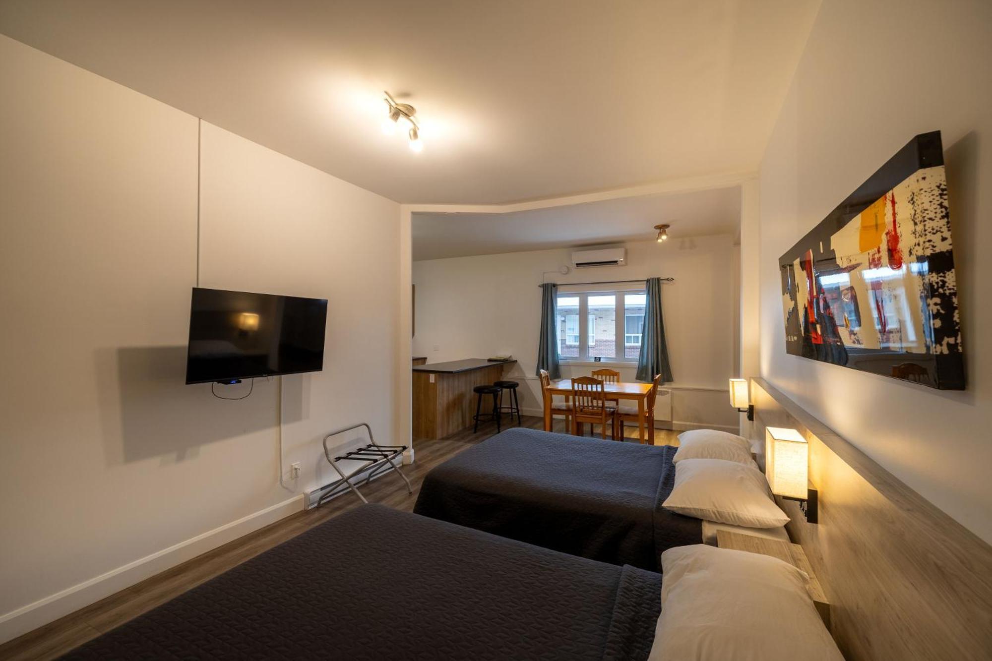 Motel Et Condo Chez Charley Сент-Анн-де-Бопре Экстерьер фото